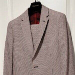 Valentino suit size 46R or 36R.  Red and Navy check.  Rare and perfect. 32 waist